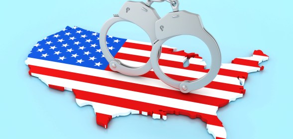 3D Handcuffs with USA Country Shape with American Flag - Colored Background - 3D Rendering