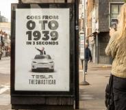 A poster at a London bus stop reading "0 to 1939" and featuring a graphic of the Tesla boss appearing to give a Nazi Salute