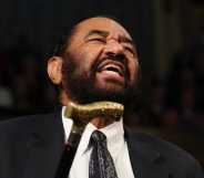 Rep. Al Green (D-TX) shouts out as U.S. President Donald Trump addresses a joint session of Congress at the U.S. Capitol.