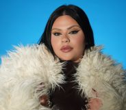 Malta's Eurovision entrant Miriana Conte in a white fur coat against a blue background.