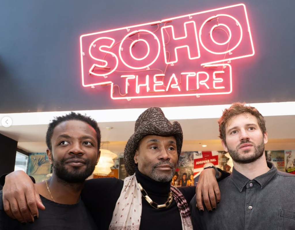 Omari Douglas, Billy Porter and Alexander Lincoln against a neon SOHO THEATRE sign.