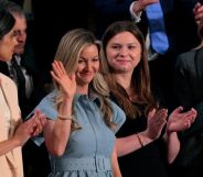 January Littlejohn (2-R) reacts as Second Lady Usha Vance (L) and First Lady Melania Trump (R) look on during US President Donald Trump's address to a joint session of Congress at the U.S. Capitol.