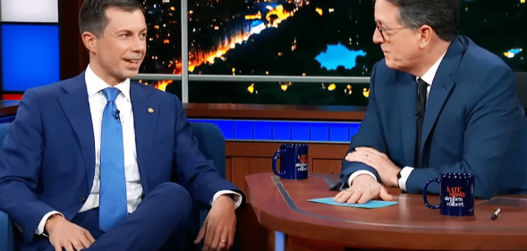 Pete Buttigieg speaking to Stephen Colbert