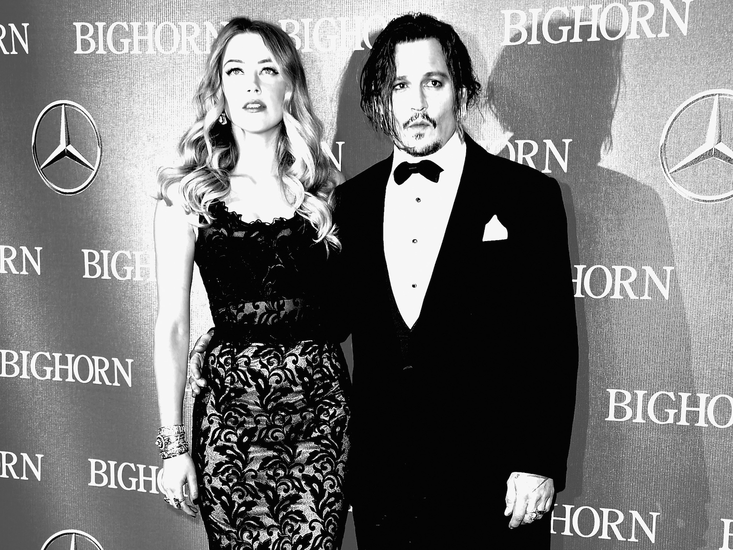 PALM SPRINGS, CA - JANUARY 02: (EDITORS NOTE: Image Converted from Color to BW). Actors Amber Heard and Johnny Depp arrive at the 27th Annual Palm Springs International Film Festival Awards Gala at Palm Springs Convention Center on January 2, 2016 in Palm Springs, California. (Photo by Frazer Harrison/Getty Images)