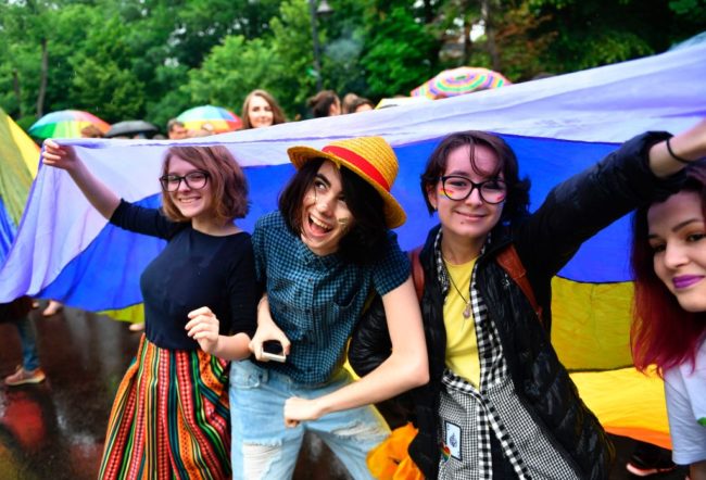 People takes part in the Bucharest Pride march on May 20, 2017. Around 2,000 people gathered to celebrate diversity and to express their support for LGBT's comunity rights.  / AFP PHOTO / Daniel MIHAILESCU AND DANIEL MIHAILESCU        (Photo credit should read DANIEL MIHAILESCU/AFP/Getty Images)