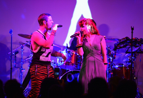 NEW YORK, NY - JUNE 07:  Ana Matronic and Jake Shears of the band Scissor Sisters perform during the 3rd annual amfAR Inspiration Gala New York at The New York Public Library - Stephen A. Schwarzman Building on June 7, 2012 in New York City.  (Photo by Jason Kempin/Getty Images)