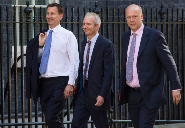 LONDON, ENGLAND - JULY 19: (L-R) Secretary of State for Health Jeremy Hunt, Lord President of the Council and Leader of the House of Commons, David Lidington and Secretary of State for Transport, Chris Grayling arrive at Downing Street for the weekly cabinet meeting on July 19, 2016 in London, England. Theresa May holds her first cabinet meeting today since becoming British Prime Minister last Wednesday, (June 13th). (Photo by Jack Taylor/Getty Images)