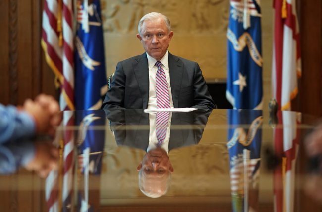 WASHINGTON, DC - JUNE 29: U.S. Attorney General Jeff Sessions meets with families of victims killed by illegal immigrants in his office at the Justice Department June 29, 2017 in Washington, DC. President Donald Trump has pledged to tighten immigration policies and the House of Representatives is in the process of voting on legislation with the same goal. (Photo by Win McNamee/Getty Images)