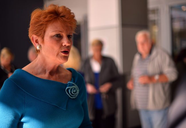 One Nation Party founder and Senate candidate Pauline Hanson (L) is pictured as she campaigns at a shopping arcade in the suburbs of Sydney on August 14, 2013. With the country's federal election set to take place on September 7, the economy is the number one issue for Australians, according to data from an interactive tool hosted by the Australian Broadcasting Corporation. Using data drawn from the first 250,000 responses and weighted to reflect the national population, it found the economy was ranked number one, with asylum-seekers a distant but clear second.       AFP PHOTO / SAEED KHAN        (Photo credit should read SAEED KHAN/AFP/Getty Images)