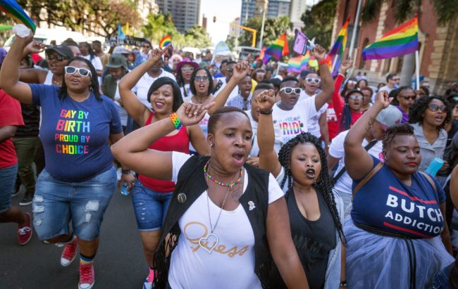 Members of the South African Lesbian, Gay, Bisexual and Transgender and Intersex (LGBTI) community chant slogans as they take part in the annual Gay Pride Parade, as part of the three-day Durban Pride Festival, on June 24, 2017 in Durban. / AFP PHOTO / RAJESH JANTILAL (Photo credit should read RAJESH JANTILAL/AFP/Getty Images)
