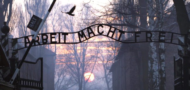(FILES) This File Picture taken on January 13, 2005 shows the main gate entering the Nazi Auschwitz death camp at sunrise.   Thieves have stolen the infamous sign at the entrance of Poland's Nazi-era concentration camp, Auschwitz, "Arbeit macht frei" ("Work will set you free"), police and museum staff reported on December 18, 2009. "The inscription was stolen early this morning," museum spokesman Jaroslaw Mensfeld told AFP.   AFP PHOTO/JANEK SKARZYNSKI (Photo credit should read JANEK SKARZYNSKI/AFP/Getty Images)