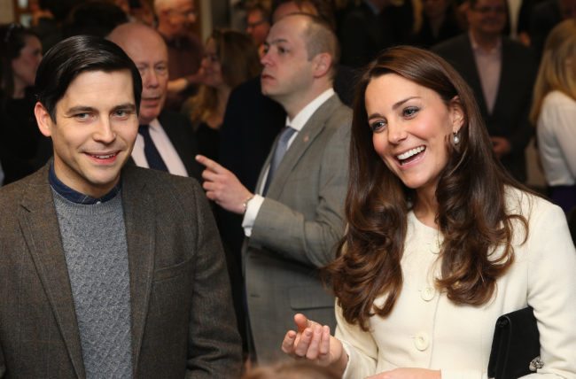 LONDON, ENGLAND - MARCH 12:  Catherine, Duchess of Cambridge shares a joke with actor Robert James-Collier (Thomas) during an official visit to the set of Downton Abbey at Ealing Studios on March 12, 2015 in London, England.  (Photo by Chris Jackson - WPA Pool/Getty Images)
