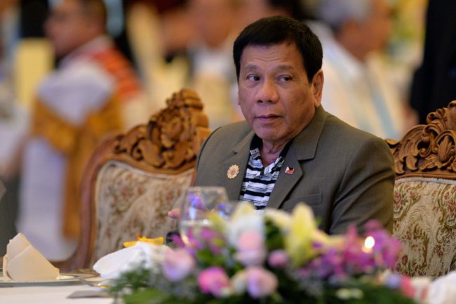 Philippine President Rodrigo Duterte (C) attends a welcome dinner at the ASEAN Summit in Vientiane on September 6, 2016. The gathering will see the 10 ASEAN members meet by themselves, then with leaders from the US, Japan, South Korea and China.  / AFP PHOTO / YE AUNG THU        (Photo credit should read YE AUNG THU/AFP/Getty Images)