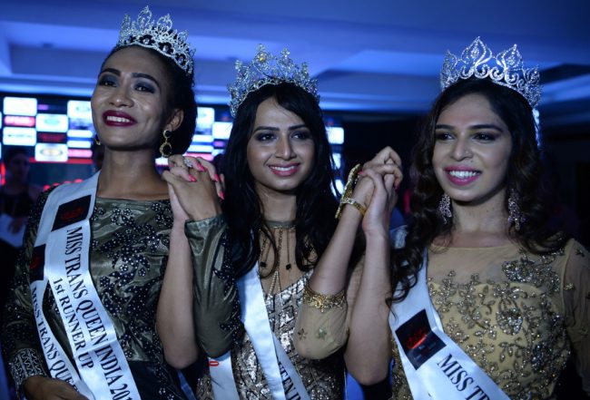 In this photograph taken on August 27, 2017, Miss Transqueen 2017 winner Nitasha (C) poses with runners-up Loiloi (L) and Ragasya (R) at a beauty pageant for transgender people in Gurgaon near the Indian capital New Delhi. The top three winners of the Miss Transqueen India 2017 contest will represent India at the Miss International Queen contest in Thailand in 2018. / AFP PHOTO / SAJJAD HUSSAIN        (Photo credit should read SAJJAD HUSSAIN/AFP/Getty Images)