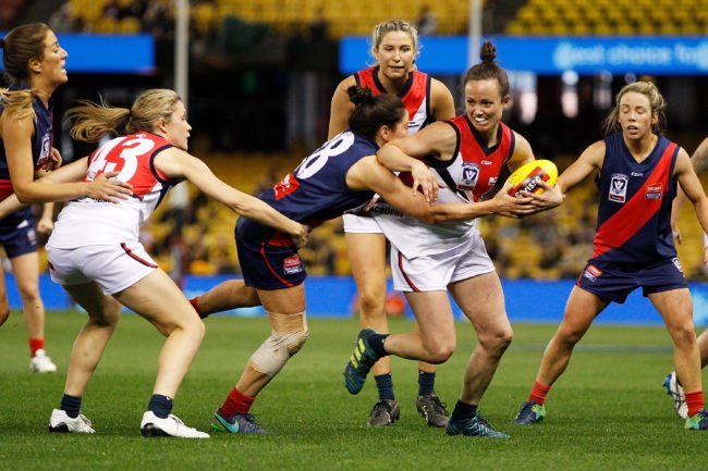 MELBOURNE, AUSTRALIA - SEPTEMBER 24:  Daisy Pearce of Darebin is tackled by Shae Audley of Diamond Creek during the VFL Women's Grand Final match between Diamond Creek and Darebin at Etihad Stadium on September 24, 2017 in Melbourne, Australia.  (Photo by Daniel Pockett/AFL Media/Getty Images)
