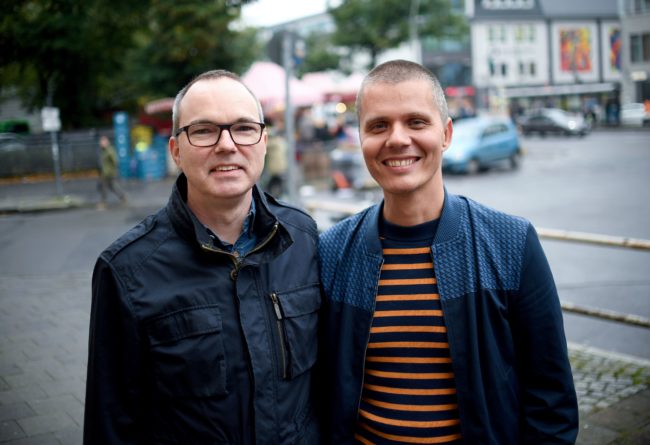German couple Michael (L) and Kai Korok pose on October 10, 2017 in Berlin, after they became the first same-sex couple to adopt a child in Germany, only ten days after Germany allowed same-sex couples to wed from October 1.   Berliners Michael and Kai Korok promptly transformed their civil partnership into marriage on October 2, and two days later, they submitted their wedding certificate to seek legal adoption of a two-year-old boy who has lived with them as a foster child since birth.  / AFP PHOTO / dpa / Britta Pedersen / Germany OUT        (Photo credit should read BRITTA PEDERSEN/AFP/Getty Images)