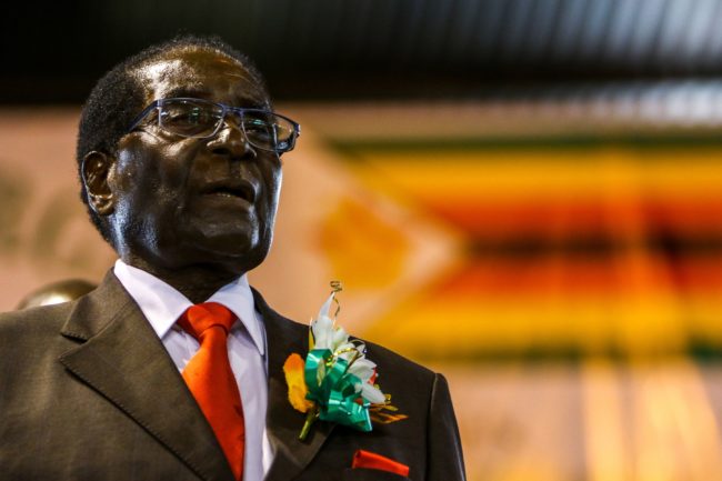 Zimbabwe President Robert Mugabe attends a meeting with the Zimbabwe National Liberation War Veterans Associatioin on April 7, 2016 in Harare. / AFP PHOTO / JEKESAI NJIKIZANA (Photo credit should read JEKESAI NJIKIZANA/AFP/Getty Images)