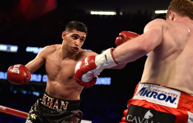 LAS VEGAS, NEVADA - MAY 07: Amir Khan (L) and Canelo Alvarez battle during a WBC middleweight title fight at T-Mobile Arena on May 7, 2016 in Las Vegas, Nevada. Alvarez won by a sixth round knockout. (Photo by David Becker/Getty Images)
