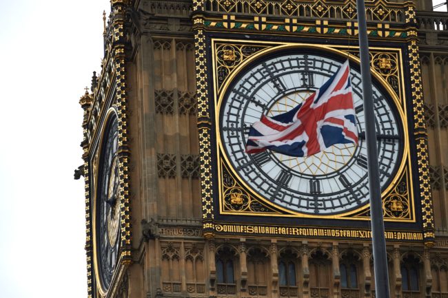 A Union flags flies at half mast over Portcullis House in front of the clock face of Queen Elizabeth Tower (Big Ben) at the Houses of Parliament in honour of slain Labour MP Jo Cox in London on June 20, 2016. British lawmakers gathered Monday to honour a murdered colleague, attempting a rare show of unity in a heated, neck-and-neck race for votes three days before a referendum on whether to quit the EU.  / AFP / Niklas HALLE'N        (Photo credit should read NIKLAS HALLE'N/AFP/Getty Images)