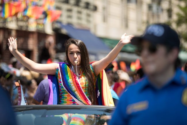 NEW YORK, NY - JUNE 26: Parade grand marshall Jazz Jennings, 15-year-old honorary co-founder of the Transkids Purple Rainbow Foundation, rides in a car during the New York City Pride March, June 26, 2016 in New York City. This year was the 46th Pride march in New York City. (Photo by Drew Angerer/Getty Images)