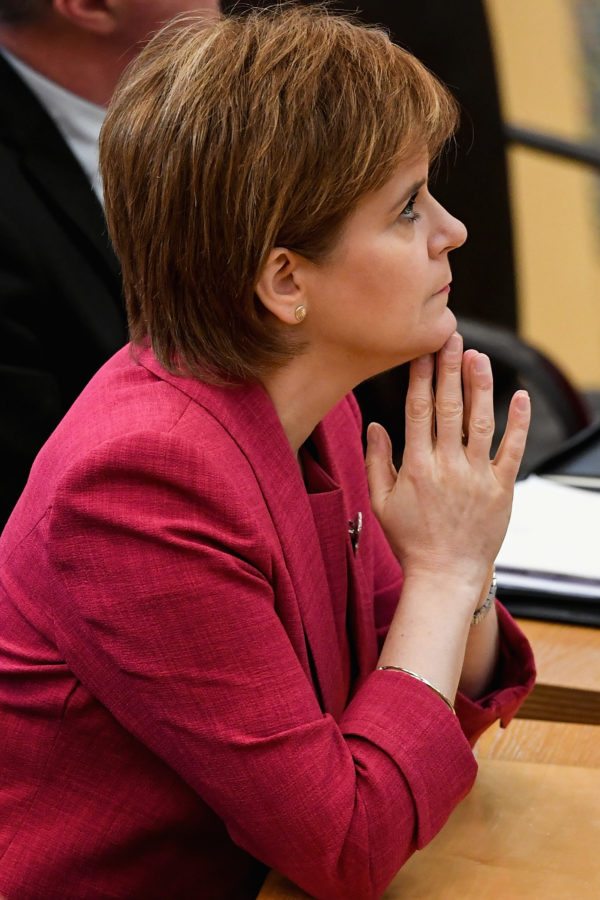 EDINBURGH, SCOTLAND - NOVEMBER 07:  First Minister Nicola Sturgeon, prepares to make a formal apology to gay men at the Scottish Parliament on November 7, 2017 in Edinburgh, Scotland. The statement coincided with a new legislation that will automatically pardon gay and bisexual men convicted under historical laws.  (Photo by Jeff J Mitchell/Getty Images)