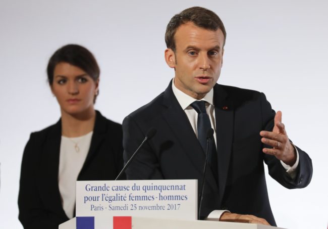 French President Emmanuel Macron (R) stands next to French Junior Minister for Gender Equality Marlene Schiappa as he delivers a speech during the International Day for the Elimination of Violence Against Women, on November 25, 2017 at the Elysee Palace in Paris. / AFP PHOTO / POOL / ludovic MARIN        (Photo credit should read LUDOVIC MARIN/AFP/Getty Images)