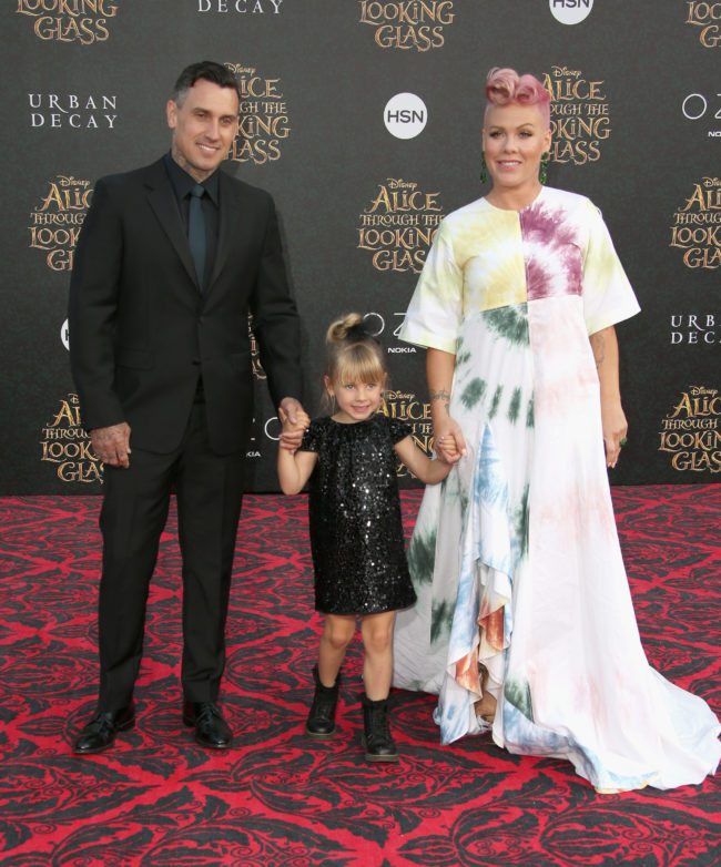 HOLLYWOOD, CA - MAY 23: (L-R) Motorcycle Racer Carey Hart, Willow Sage Hart and singer-songwriter P!nk attend the premiere of Disney's "Alice Through The Looking Glass at the El Capitan Theatre on May 23, 2016 in Hollywood, California. (Photo by Frederick M. Brown/Getty Images)