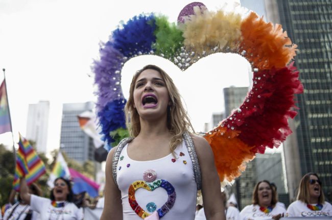 Revelers take part in the 21st Gay Pride Parade, whose theme is "Secular State", in Sao Paulo, Brazil on June 18, 2017. / AFP PHOTO / Miguel SCHINCARIOL (Photo credit should read MIGUEL SCHINCARIOL/AFP/Getty Images)