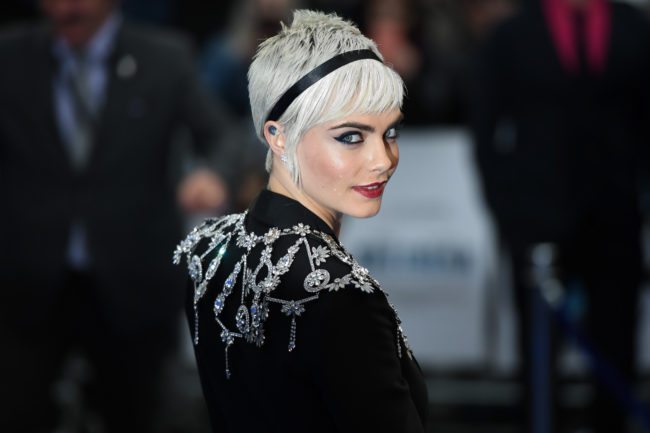 TOPSHOT - British model and actress Cara Delevingne poses for a photograph upon arrival for the European premiere of "Valerian and The City of a Thousand Planets" in London on July 24, 2017. / AFP PHOTO / Chris J Ratcliffe        (Photo credit should read CHRIS J RATCLIFFE/AFP/Getty Images)