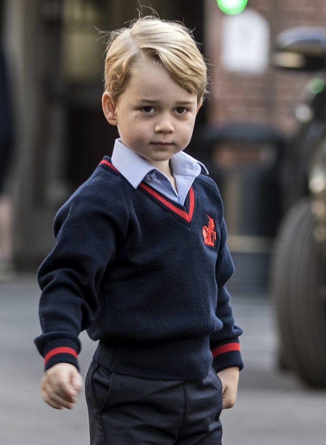TOPSHOT - Britain's Prince George arrives for his first day of school at Thomas's school in Battersea, southwest London on September 7, 2017. / AFP PHOTO / POOL / RICHARD POHLE (Photo credit should read RICHARD POHLE/AFP/Getty Images)
