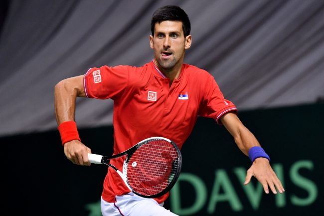 Serbia's Novak Djokovic runs to return the ball to Russia's Daniil Medvedev during the Davis Cup World Group first round singles tennis match between Serbia and Russia at Cair sports hall in Nis, on February 3, 2017. / AFP / ANDREJ ISAKOVIC (Photo credit should read ANDREJ ISAKOVIC/AFP/Getty Images)