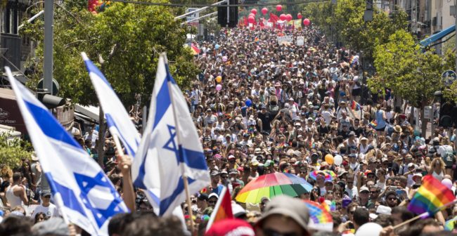 Participants take part in the annual Gay Pride parade in the Israeli city of Tel Aviv / AFP PHOTO / JACK GUEZ (Photo credit should read JACK GUEZ/AFP/Getty Images)