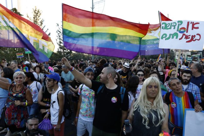 Participants attend the annual Jerusalem Gay Pride Parade on August 3, 2017.  / AFP PHOTO / Gali TIBBON        (Photo credit should read GALI TIBBON/AFP/Getty Images)