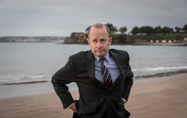 TORQUAY, ENGLAND - SEPTEMBER 30: Newly elected UKIP leader Henry Bolton walks on the beach following morning TV interviews at their autumn conference on September 30, 2017 in Torquay, England. Bolton is the UKIP party's fourth leader in just over a year. (Photo by Matt Cardy/Getty Images)