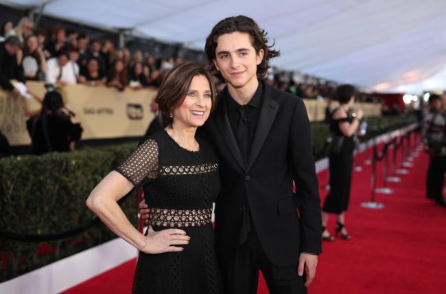 LOS ANGELES, CA - JANUARY 21: Nicole Flender (L) and actor Timothee Chalamet attend the 24th Annual Screen Actors Guild Awards at The Shrine Auditorium on January 21, 2018 in Los Angeles, California. 27522_010 (Photo by Christopher Polk/Getty Images for Turner Image)