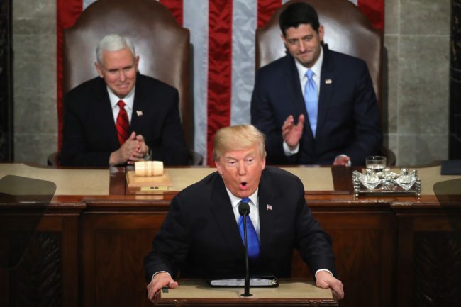 WASHINGTON, DC - JANUARY 30: U.S. President Donald J. Trump delivers the State of the Union address as U.S. Vice President Mike Pence (L) and Speaker of the House U.S. Rep. Paul Ryan (R-WI) (R) look on in the chamber of the U.S. House of Representatives January 30, 2018 in Washington, DC. This is the first State of the Union address given by U.S. President Donald Trump and his second joint-session address to Congress. (Photo by Chip Somodevilla/Getty Images)