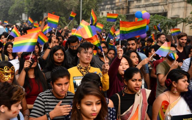 Indian members and supporters of the lesbian, gay, bisexual, transgender (LGBT) community take part in a pride parade in New Delhi on November 12, 2017. Hundreds of members of the LGBT community marched through the Indian capital for the 10th annual Delhi Queer Pride Parade. / AFP PHOTO / SAJJAD HUSSAIN (Photo credit should read SAJJAD HUSSAIN/AFP/Getty Images)