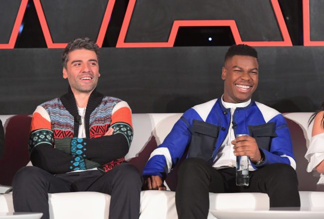 LOS ANGELES, CA - DECEMBER 03: Actors Oscar Isaac (L) and John Boyega attend the press conference for the highly anticipated Star Wars: The Last Jedi at InterContinental Los Angeles on December 3, 2017 in Los Angeles, California.  (Photo by Charley Gallay/Getty Images for Disney )