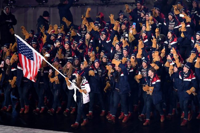 PYEONGCHANG-GUN, SOUTH KOREA - FEBRUARY 09: Flag bearer Erin Hamlin of the United States and teammates enter the stadium during the Opening Ceremony of the PyeongChang 2018 Winter Olympic Games at PyeongChang Olympic Stadium on February 9, 2018 in Pyeongchang-gun, South Korea. (Photo by Pool - Frank Fife/Getty Images)