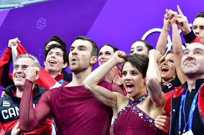 Canada's Meagan Duhamel (centre R) and Canada's Eric Radford (centre L) react after competing in the figure skating team event pair skating free skating during the Pyeongchang 2018 Winter Olympic Games at the Gangneung Ice Arena in Gangneung on February 11, 2018. / AFP PHOTO / Mladen ANTONOV (Photo credit should read MLADEN ANTONOV/AFP/Getty Images)