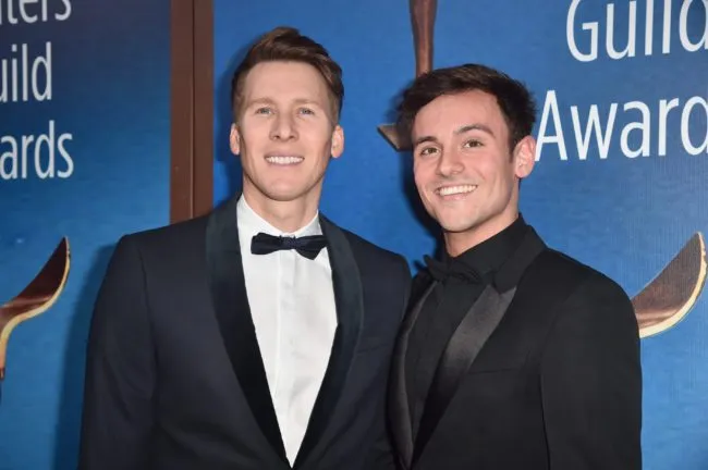 BEVERLY HILLS, CA - FEBRUARY 11: Dustin Lance Black and Tom Daley attends the 2018 Writers Guild Awards L.A. Ceremony at The Beverly Hilton Hotel on February 11, 2018 in Beverly Hills, California. (Photo by Alberto E. Rodriguez/Getty Images for 2018 Writers Guild Awards L.A. Ceremony )