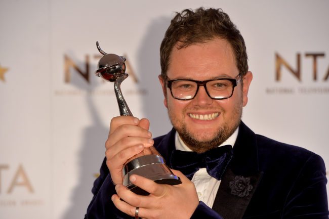 LONDON, ENGLAND - JANUARY 21:  Alan Carr poses in the winners room with his award for Best Chat Show Host at the National Television Awards at 02 Arena on January 21, 2015 in London, England.  (Photo by Anthony Harvey/Getty Images)