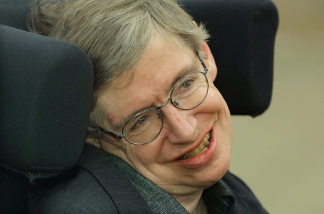 399485 04: Physicist Stephen Hawking smiles at a symposium to honor his birthday at the Center for Mathematical Sciences at the University of Cambridge January 11, 2002 in Cambridge, England. Hawking turned 60-years-old on January 8, 2002 and is the Lucasian Professor of Mathematics, a post once held by Sir Isaac Newton. (Photo by Sion Touhig/Getty Images)