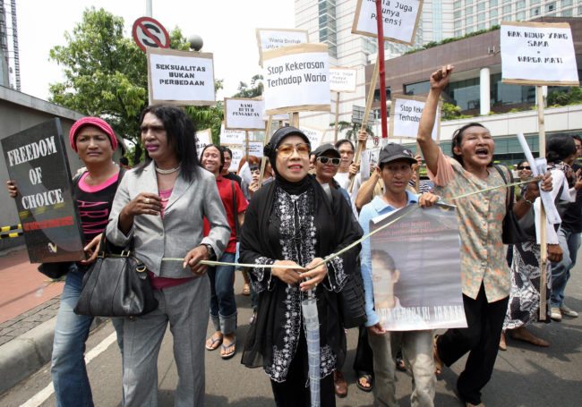 Indonesian transvestites of Solidaritas Transgender march during a protest in Jakarta, 20 November 2007. Scores of Indonesian transvestites held a protest against discrimination on transvestites, transexual, gay and lesbian in Indonesia, the most populous Muslim country in the world. AFP PHOTO/ADEK BERRY (Photo credit should read ADEK BERRY/AFP/Getty Images)
