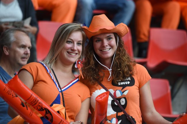 Netherlands' supporters smile prior to the UEFA Womens Euro 2017 football tournament semi-final match between Netherlands and England at the FC Twente Stadium, in Enschede on August 3, 2017. / AFP PHOTO / Daniel MIHAILESCU (Photo credit should read DANIEL MIHAILESCU/AFP/Getty Images)