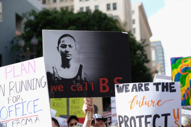 LOS ANGELES, CA - MARCH 24:  A sign featuring Marjory Stoneman Douglas High School student Emma Gonzalez is seen at the March for Our Lives Los Angeles rally on March 24, 2018 in Los Angeles, California. More than 800 March for Our Lives events, organized by survivors of the Parkland, Florida school shooting on February 14 that left 17 dead, are taking place around the world to call for legislative action to address school safety and gun violence.  (Photo by Sarah Morris/Getty Images)