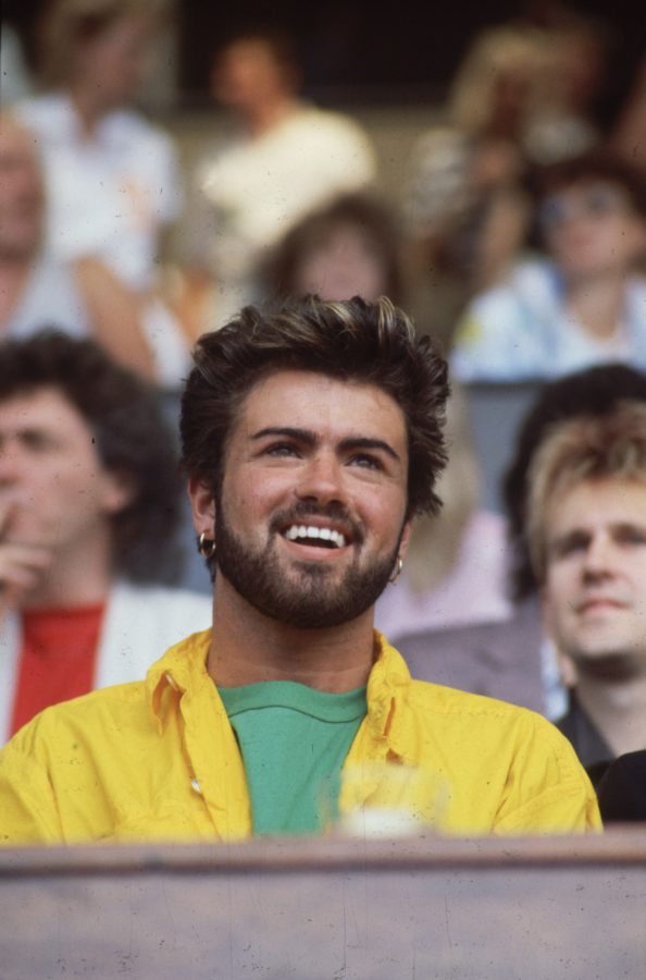 13th July 1985: British singer songwriter George Michael, lead singer of the pop group Wham!, at the Live Aid Concert in Wembley Stadium, London. (Photo by Hulton Archive/Getty Images)
