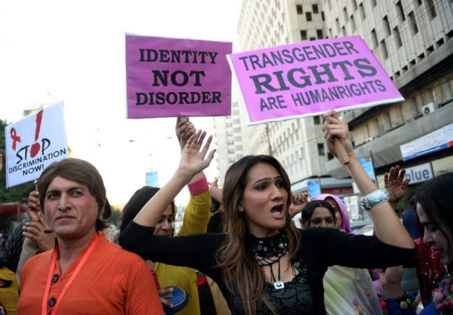 Pakistani transgender activists carry placards through Karachi (ASIF HASSAN/AFP/Getty Images)