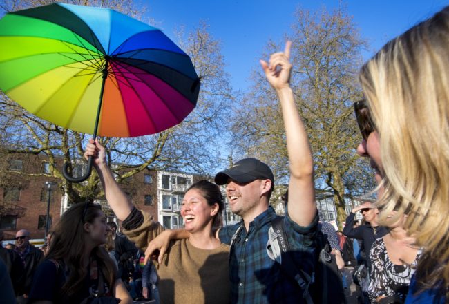 Participants are pictured during the 'Hand in Hand for Diversity' demonstration against anti-LGBT violence in Arnhem, The Netherlands, on April 8, 2017. The couple had been attacked on their way home early on April 2, 2017 in the eastern city of Arnhem. One of them lost several teeth and got a bloody lip after being attacked with a bolt-cutter. Dutch male politicians, police and diplomats have taken to streets around the world holding hands this week in a very public show of support after a brutal attack on the gay couple. / AFP PHOTO / ANP / Piroschka van de Wouw / Netherlands OUT (Photo credit should read PIROSCHKA VAN DE WOUW/AFP/Getty Images)