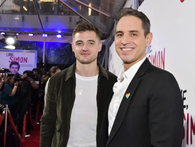 LOS ANGELES, CA - MARCH 13: Director Greg Berlanti (R) and soccer player Robbie Rogers attend a special screening of 20th Century Fox's "Love, Simon" at Westfield Century City on March 13, 2018 in Los Angeles, California. (Photo by Rodin Eckenroth/Getty Images)